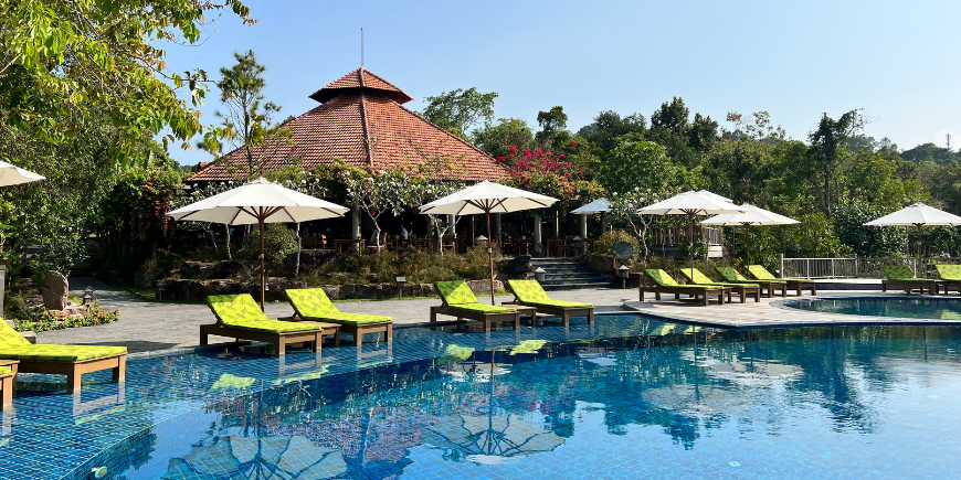 Pool and sunbeds at Green Bay Resort in Phu Quoc