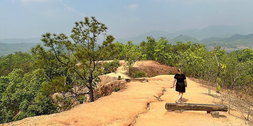 Michelle walks at Pai Canyon
