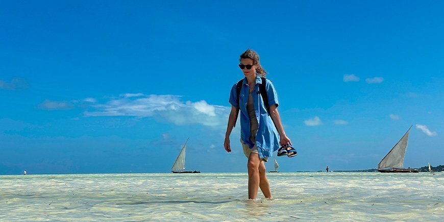 Ingun walking on the beach in Paje on Zanzibar