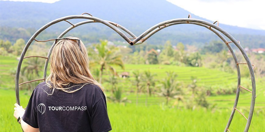 Female TourCompass team member checking out rice terraces in Bali in September