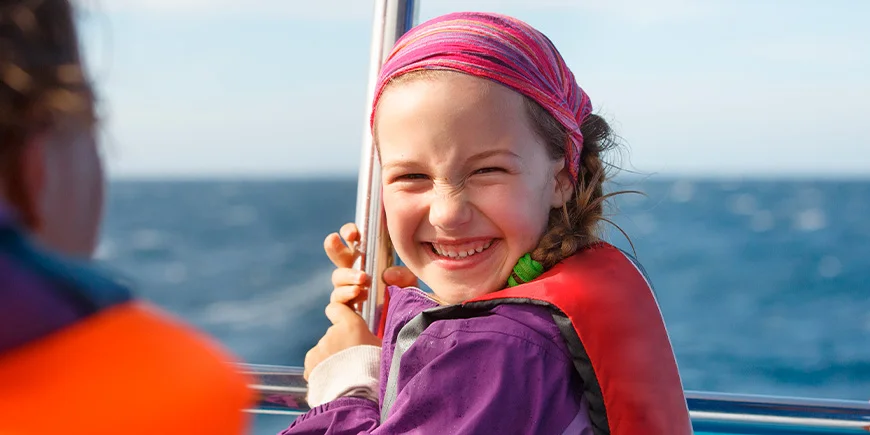Girl on whale watching safari at Mirissa in Sri Lanka
