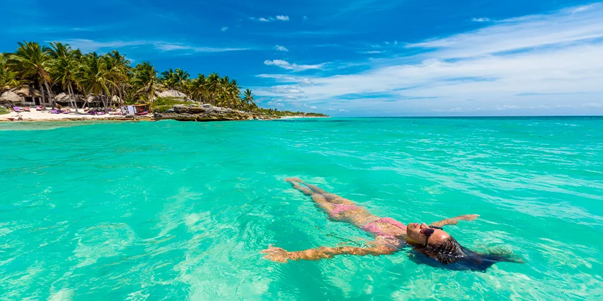 Woman in the water at Tulum Beach