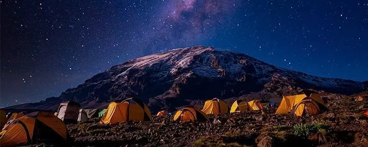 Camp under the stars in front of Kilimanjaro
