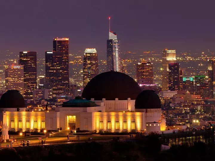 Griffith Observatory in Los Angeles in the dark overlooking the city
