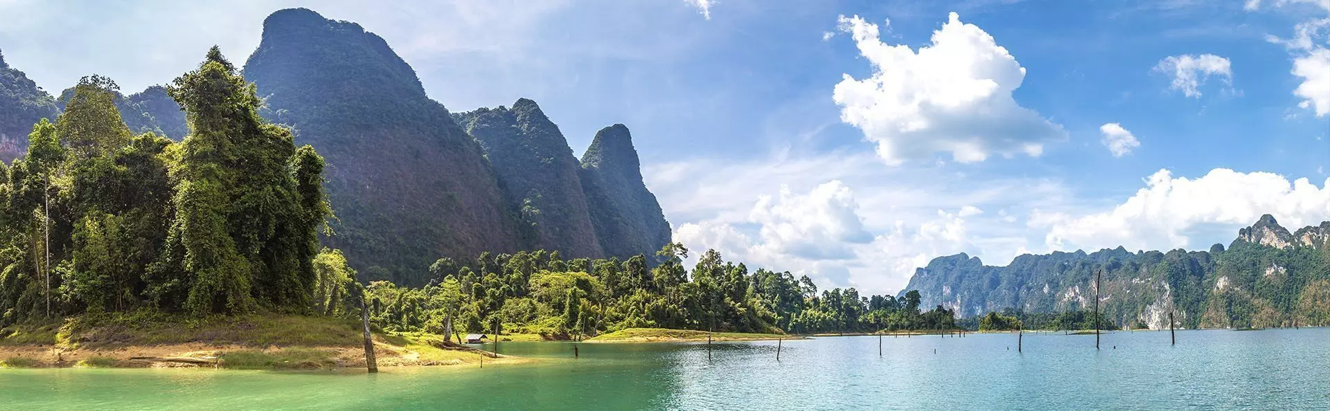 Sunny day at Cheow Lan Lake in Khao Sok National Park.