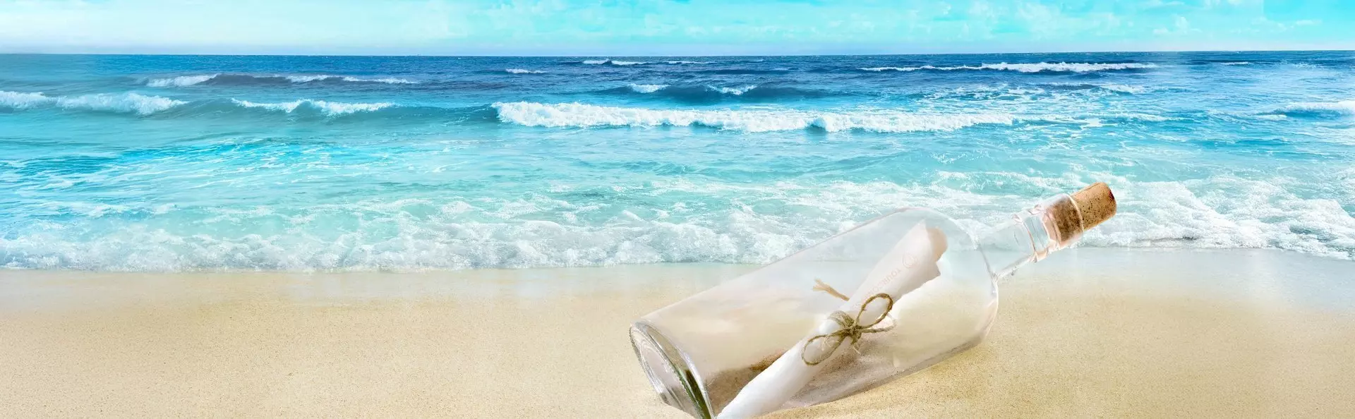 Message in a bottle at the water's edge