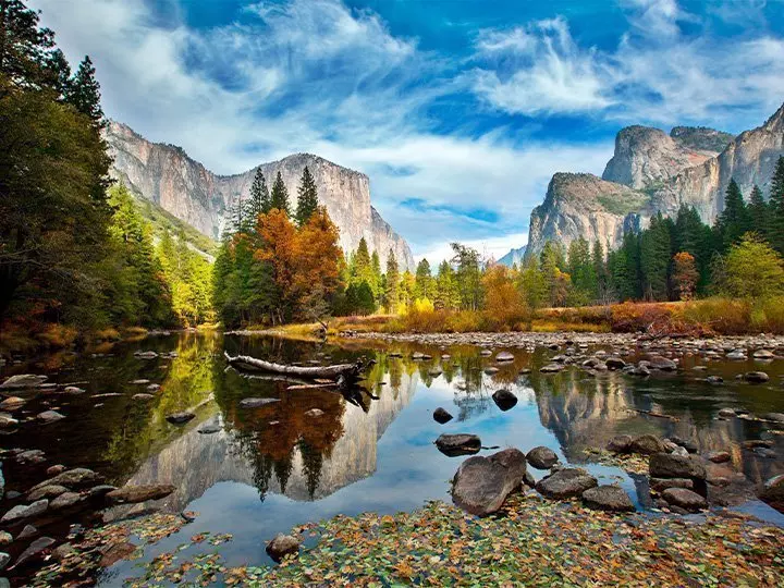 El Capitan and Merced River in Yosemite National Park covered in autumn colours
