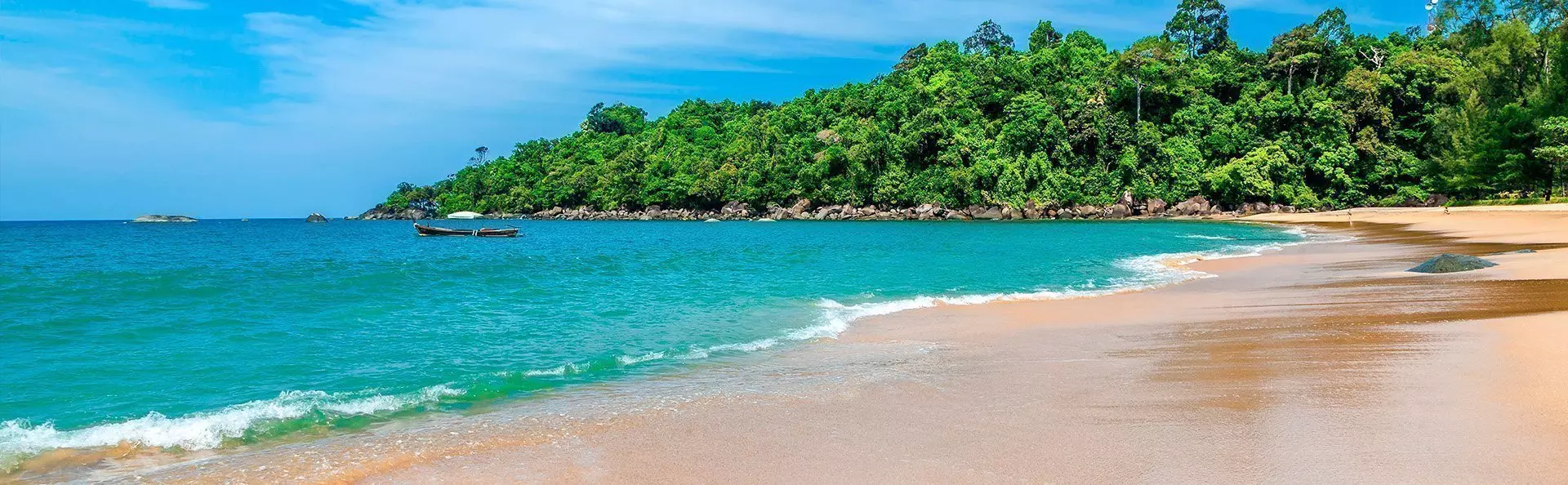 Beautiful sandy beach with azure waters at Khao Lak.