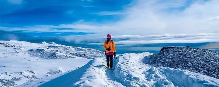 Hiker in the snow on Kilimanjaro
