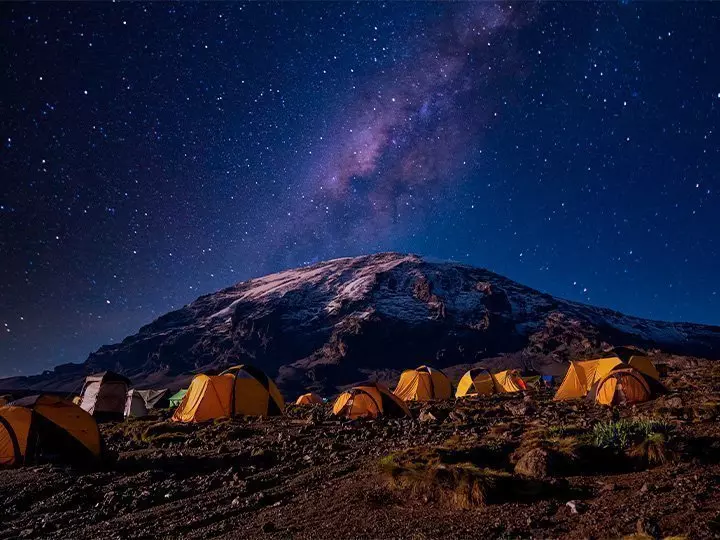Camp under the stars in front of Kilimanjaro