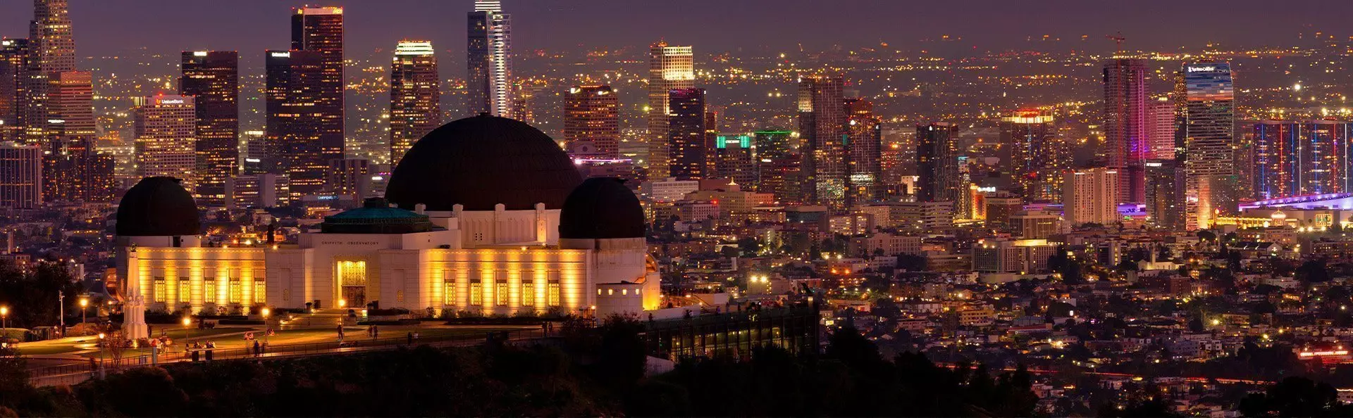 Griffith Observatory in Los Angeles in the dark overlooking the city